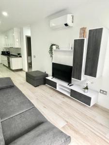 A kitchen or kitchenette at ISLAND SUITES