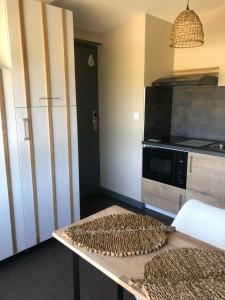 Fotografia z galérie ubytovania La suite cosy de Julie , 2 pièces parking privé Résidence Cosyade v destinácii Bourbourg