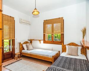 A bed or beds in a room at Casa Gaia