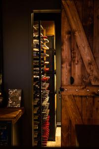 a wine cellar with a rack of wine bottles at Aurora Lodge Hotel in Hvolsvöllur