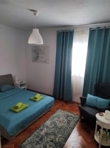 Postel nebo postele na pokoji v ubytování LuMar Holidays and Apartments