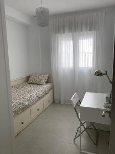 Posteľ alebo postele v izbe v ubytovaní APARTAMENTO SAN JUAN