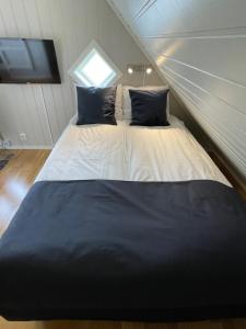 Postel nebo postele na pokoji v ubytování Novatind - Studio apartment with free parking