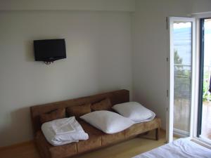 Postel nebo postele na pokoji v ubytování Apartments Đerek Pisak