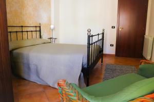Postel nebo postele na pokoji v ubytování Bed and breakfast Agrumi in terrazza