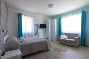 Imagen de la galería de Roccabianca Rooms & Studios, en Stintino