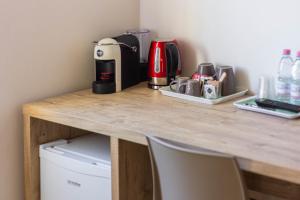 Kaffe- og tefaciliteter på Roccabianca Rooms & Studios