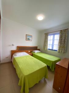 Postel nebo postele na pokoji v ubytování Atalaya Apartment Vista Mar