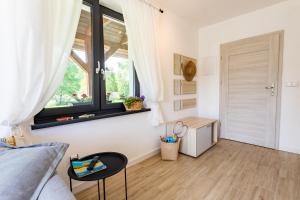 Zdjęcie z galerii obiektu Apartamenty - Dom Smołdziński Las w Smołdzińskim Lesie
