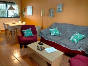 Posedenie v ubytovaní Apartamento con encanto, terraza y parking cubierto + 2 fotografie