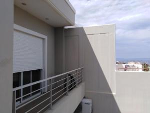 Balkón nebo terasa v ubytování Jenny's Sea View Maisonette
