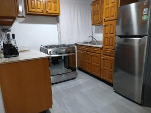 Kuchyň nebo kuchyňský kout v ubytování Casa M&J Cd. Juarez