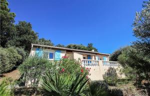 a house on a hill with bushes and trees at 3 Bedroom Lovely Home In Colonzelle in Colonzelle +14 photos