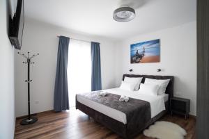 Postel nebo postele na pokoji v ubytování ONYX