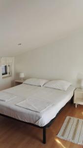 Posteľ alebo postele v izbe v ubytovaní Apartment Dalma