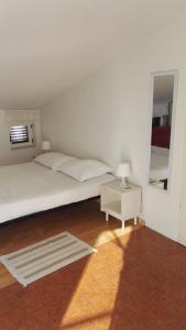 Posteľ alebo postele v izbe v ubytovaní Apartment Dalma
