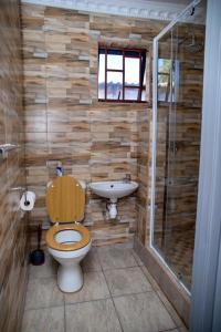 Ένα μπάνιο στο Ecogreen Guesthouse