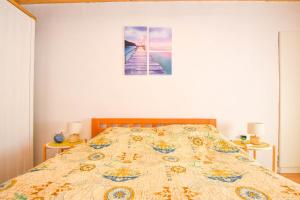 Łóżko lub łóżka w pokoju w obiekcie Apartment Fjaka