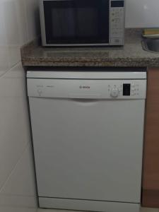 A kitchen or kitchenette at Alquiler Vacacional Salou W&S