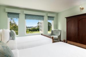 Jetwing Broomfield Bungalow房間的床