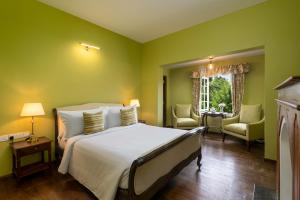 Jetwing Broomfield Bungalow房間的床