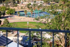 a view of a park from a balcony at במיוחד בשבילך צימר ערד in Arad