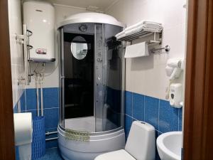 Ванная комната в Отель Хуторок