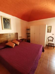 Postel nebo postele na pokoji v ubytování Casa MAMMUCCIA