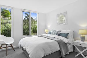 Katil atau katil-katil dalam bilik di Point Grey Apartment 16