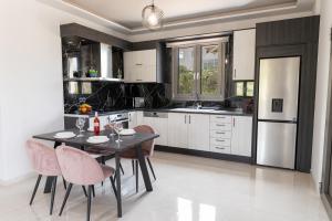 Kuchyň nebo kuchyňský kout v ubytování Destino Luxury Apts