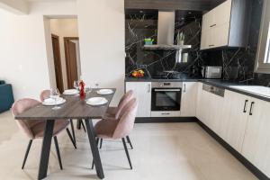 Kuchyň nebo kuchyňský kout v ubytování Destino Luxury Apts