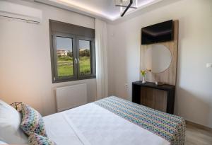 Postel nebo postele na pokoji v ubytování Destino Luxury Apts