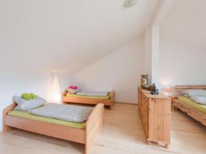 Postel nebo postele na pokoji v ubytování Wonderful holiday home in Kaprun Piesendorf with garden