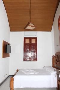 Μια τηλεόραση ή/και κέντρο ψυχαγωγίας στο Hotel Fazenda Arara Azul