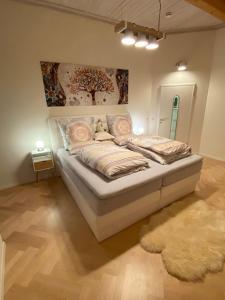 Postel nebo postele na pokoji v ubytování Ferienwohnung Lichtgalerie