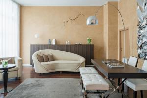 Гостиная зона в Ricasoli Firenze Luxury Apartments | UNA Esperienze