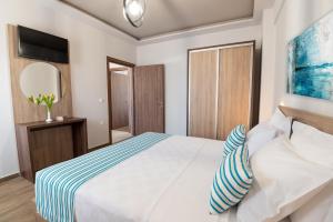 Postel nebo postele na pokoji v ubytování Destino Luxury Apts