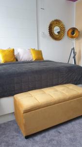 Postel nebo postele na pokoji v ubytování Květinový apartmán A3B v Chomutově