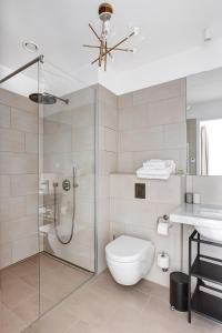 Ett badrum på Arbio I Luxury Apartments in East Side Gallery