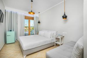 Krevet ili kreveti u jedinici u okviru objekta Hesperides Hotel Pefkochori