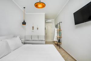 Krevet ili kreveti u jedinici u okviru objekta Hesperides Hotel Pefkochori