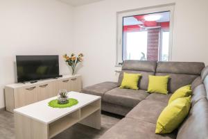 Et opholdsområde på VIP Apartment Kavo