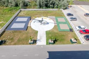 an aerial view of a basketball court with an airplane at Phoenicia Boutique Hotel - Adults Only in Mamaia Sat/Năvodari