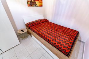 A bed or beds in a room at Antonella home b&b