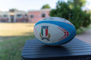 a soccer ball sitting on top of a table at La Meta sporting rooms in Alghero