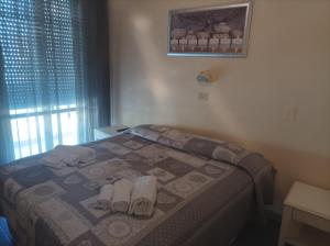 Postel nebo postele na pokoji v ubytování Hotel Amica
