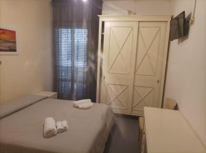 Postel nebo postele na pokoji v ubytování Hotel Amica
