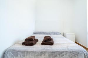 Posteľ alebo postele v izbe v ubytovaní Apartament Bellavista