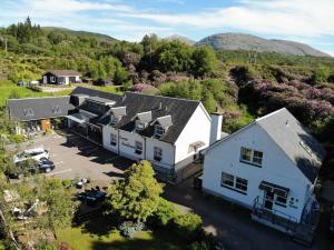 an aerial view of a large white building at Corran Bunkhouse in Onich