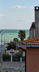a view of the ocean from a building at Colleoni 19 in Civitanova Marche
